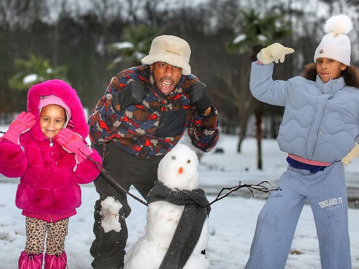 Ludacris Builds Snowman With Children In Atlanta